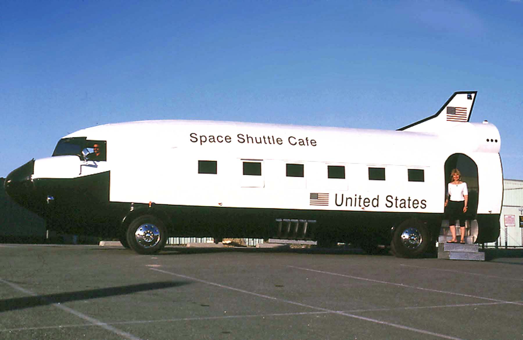 This food truck is just out of this world. That was horrible. A truly awful cliché. But c’mon, cut me some slack, when will I ever get to use a line like that again? Anyhow, this Space Shuttle Café is actually based on a converted airplane. It was originally a Douglas DC3 that actually saw military service during WWII, served many years as a commercial airliner, was converted to a camper on wheels (on a GMC bus frame), then remodeled in the image of the NASA Space Shuttle, and then retrofitted with a commercial kitchen in its final incarnation as the Space Shuttle Café.