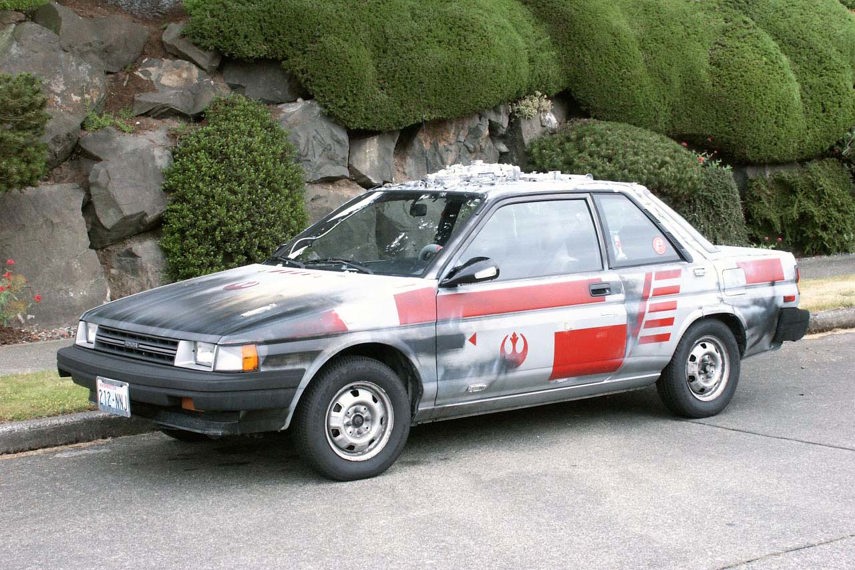 Katie Horn was bitten by the Star Wars bug in her early 20s and the end result was the decision to trick out her Toyota Tercel to look like it belonged in the Rebel Alliance’s famed Red squadron. You might recognize the name of her car - Red 5 - as the call-sign used by Luke Skywalker in the first Star Wars movie when flying his X-Wing deep into the trenches of the original Death Star. Horn eventually formed her own online fighter wing, with close to 75 individuals working on their own Star Wars-themed automotive projects (including Obi-Shawn’s various rides).